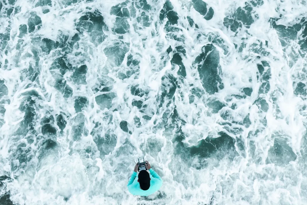 Kayaker practicing eddy turns on calm water