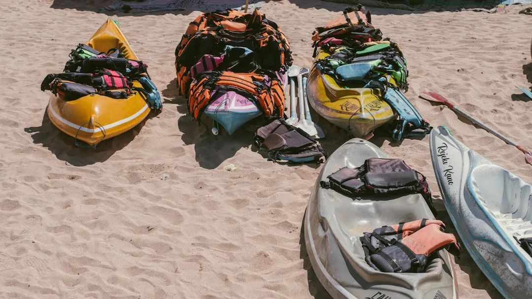 Kayaking gear laid out on dock