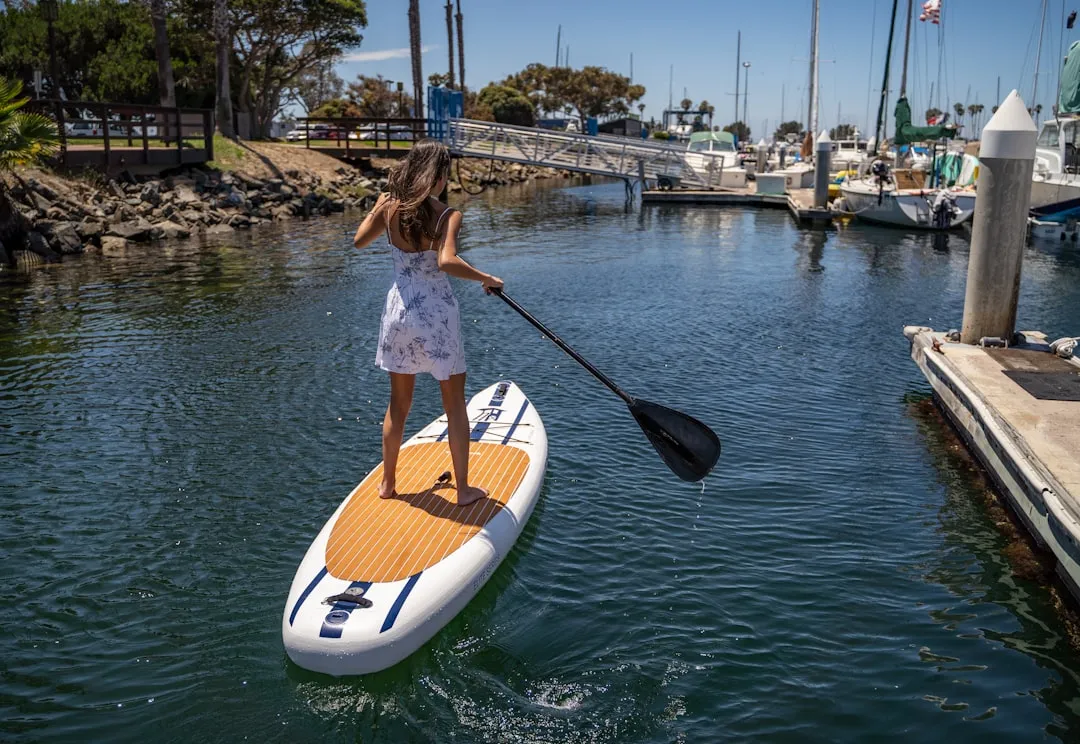 Atoll paddle board on the water