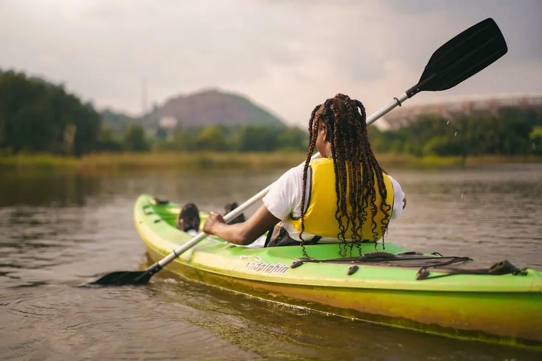 Kayaker demonstrating proper stability techniques to avoid common entry errors