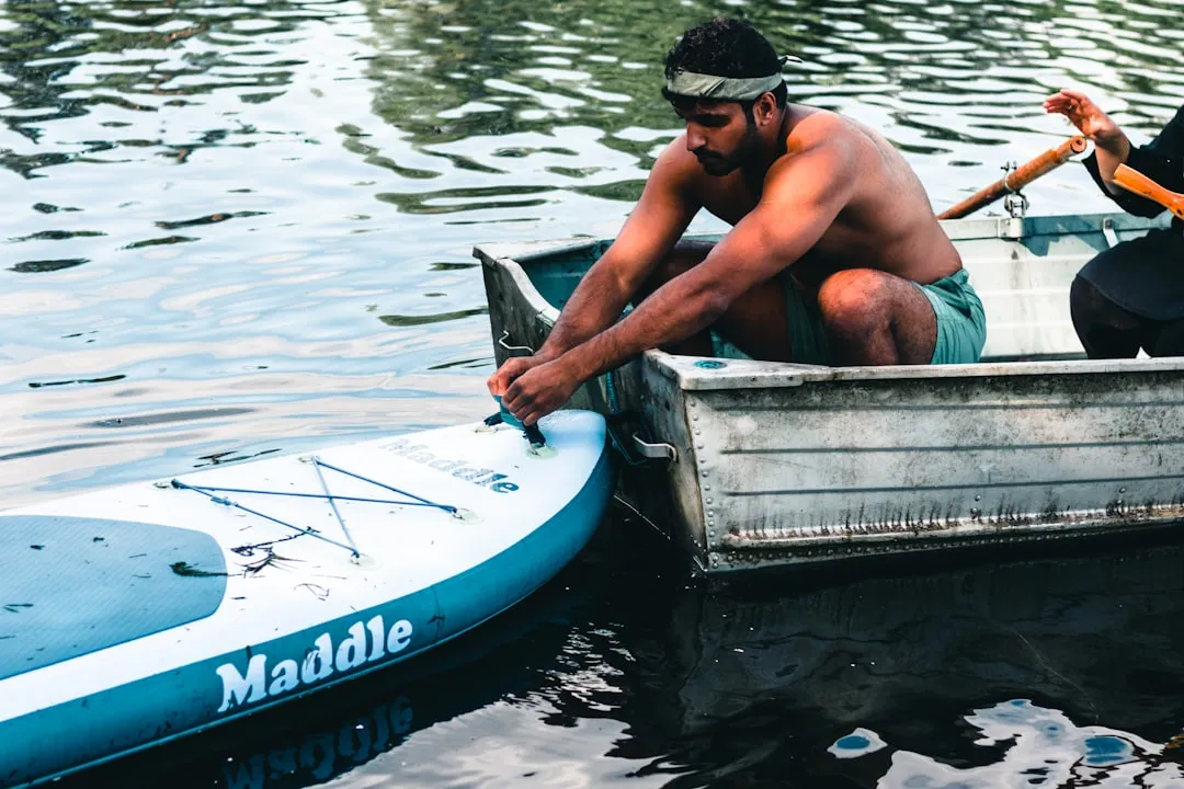 Beginner paddler on calm flatwater with stable board setup
