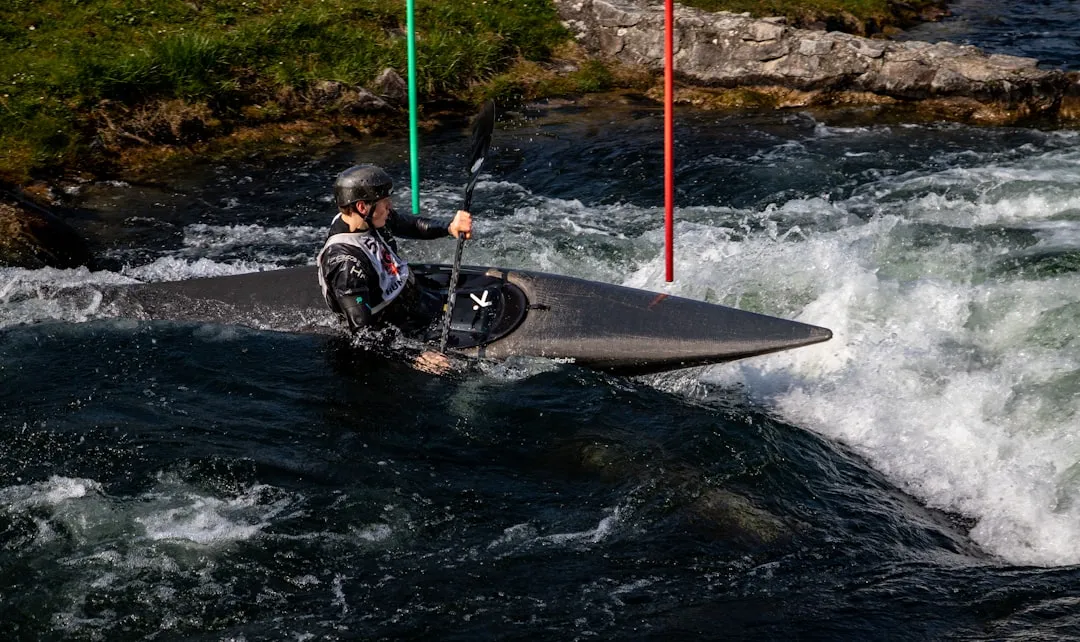 Kayaker performing a kayak roll technique