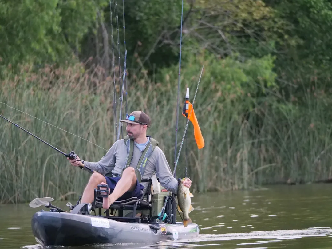Pedal drive kayak fishing setup on open water