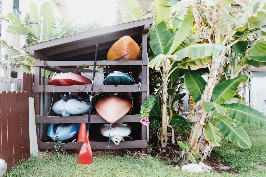 Deflated inflatable kayak rolled for storage