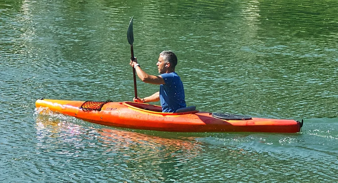 Paddler wearing life jacket and gear